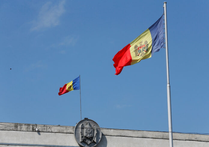 FILE PHOTO: Moldova's national flags are seen in central Chisinau