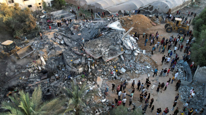View of the remains of a Palestinian house destroyed in Israeli strikes in the central Gaza Strip