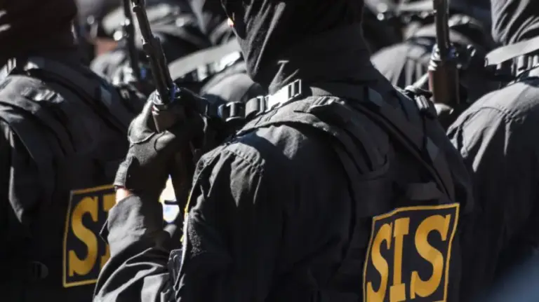 Raids by PCCOCS on a former SIS chief who is currently employed by the government